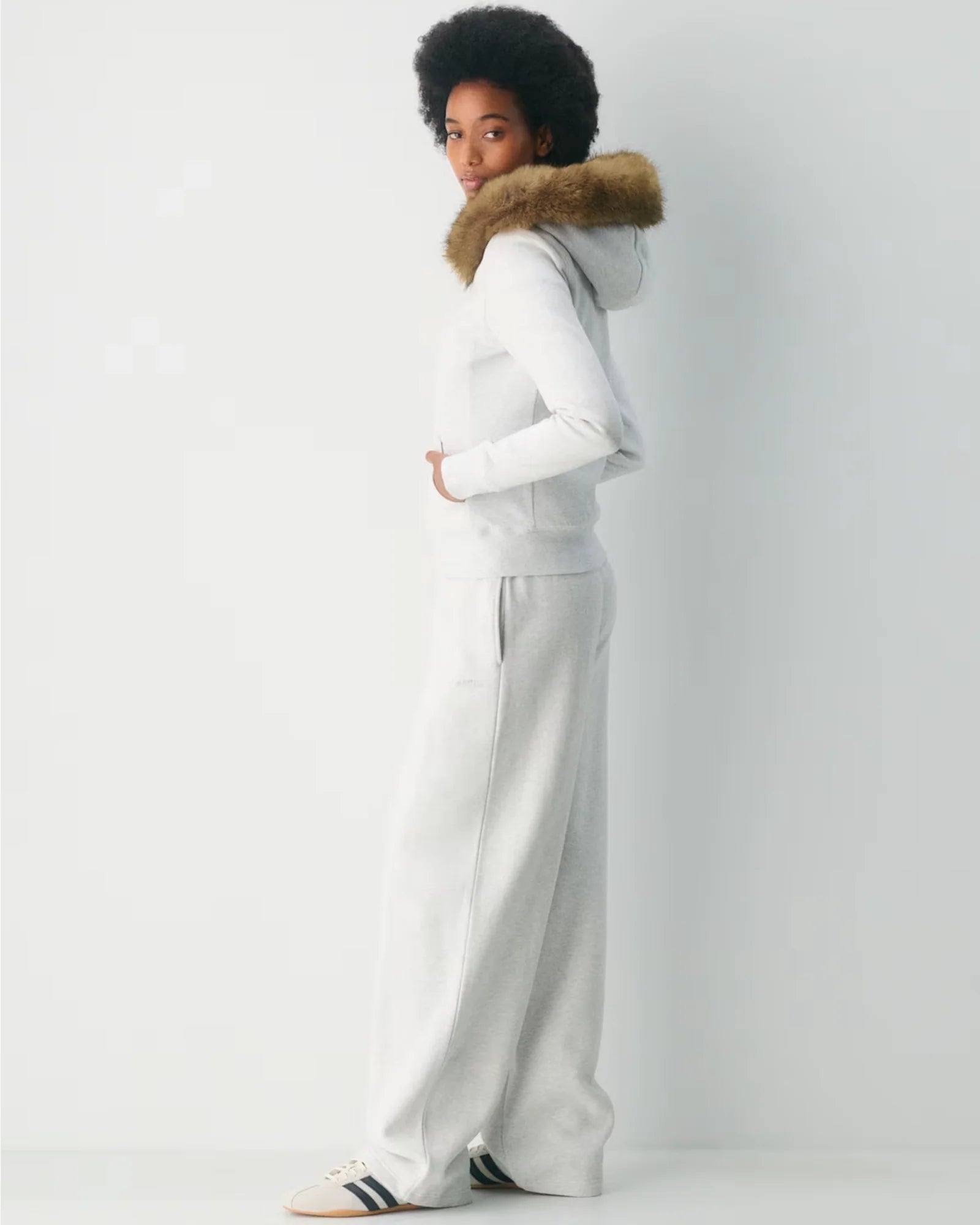 Aritzia-White-Fur-Hoodie-Side-View