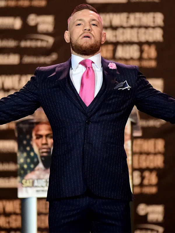 Conor McGregor looks huge in tight daring purple satin suit as UFC star