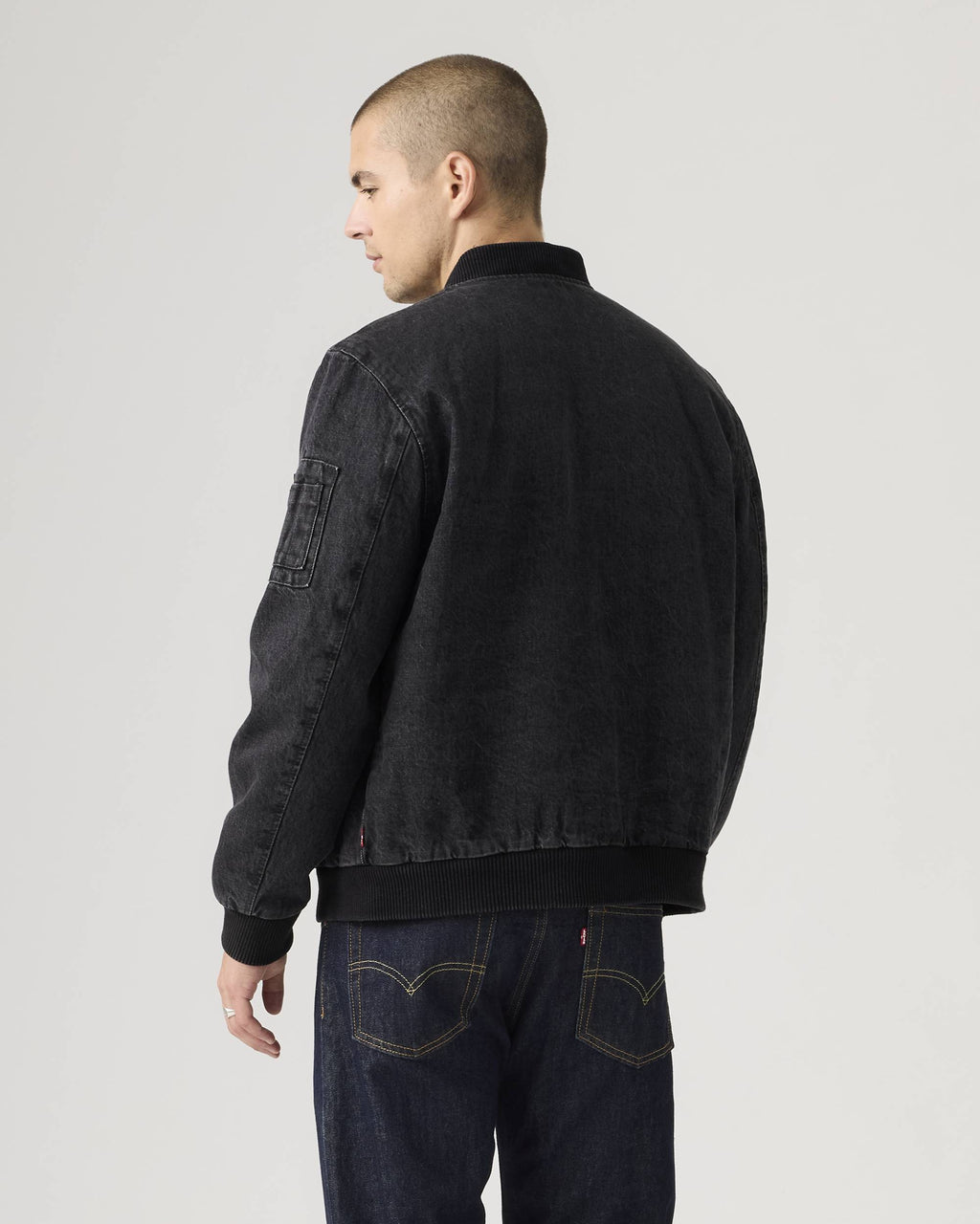 Side view of Levi’s men’s blue denim jacket