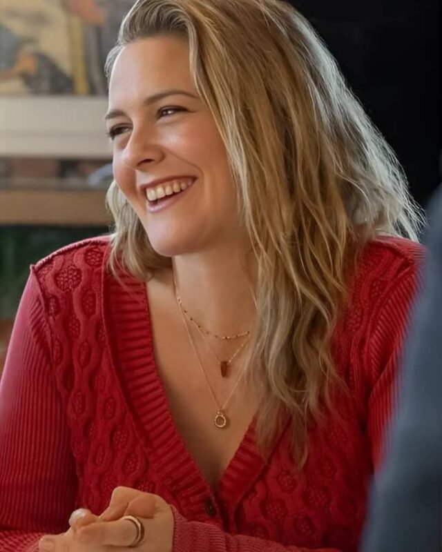 A-Merry-Little-Ex-Mas-2025-Alicia-Silverstone-Red-Cardigan