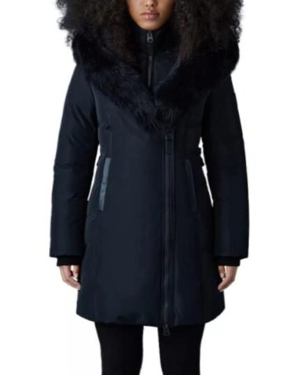 A-Merry-Little-Ex-Mas-2025-Jameela-Jamil-Black-Fur-Trim-Coat